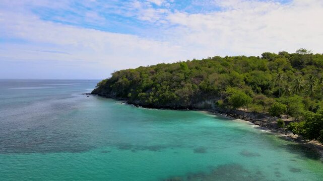 Majestic Aerial Footage: Waves Hitting the Cliffside Shoreline