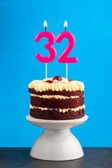 Birthday number 32 - Candle with red velvet cake