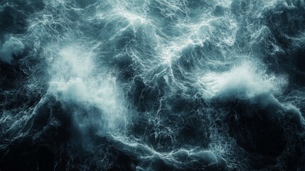 Obraz premium Aerial View of Rough Ocean Waters with Whitecaps