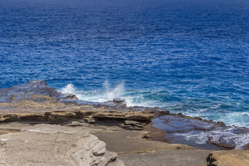 Dramatic Ocean crashing wave Hawaii at Makapu Point
