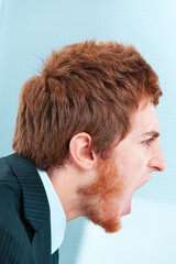 Obraz premium Businessman screaming side view profile office space for copy