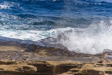 Dramatic Ocean crashing wave Hawaii at Makapu Point