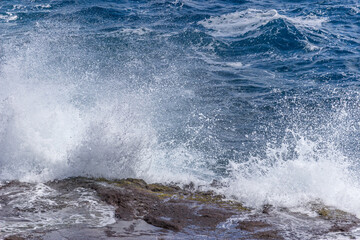 Dramatic Ocean crashing wave Hawaii at Makapu Point