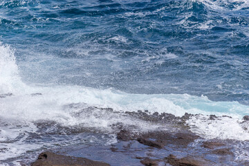 Dramatic Ocean crashing wave Hawaii at Makapu Point