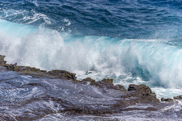 Dramatic Ocean crashing wave Hawaii at Makapu Point