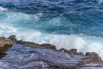 Dramatic Ocean crashing wave Hawaii at Makapu Point