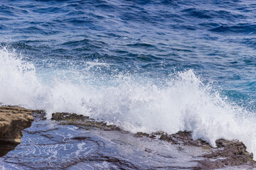 Dramatic Ocean crashing wave Hawaii at Makapu Point