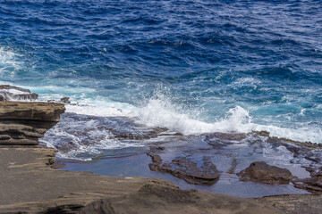 Dramatic Ocean crashing wave Hawaii at Makapu Point