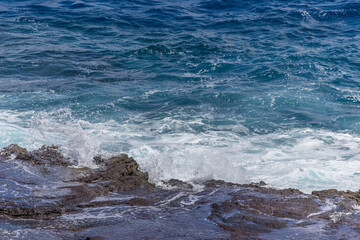 Dramatic Ocean crashing wave Hawaii at Makapu Point