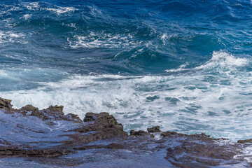 Dramatic Ocean crashing wave Hawaii at Makapu Point