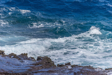 Dramatic Ocean crashing wave Hawaii at Makapu Point