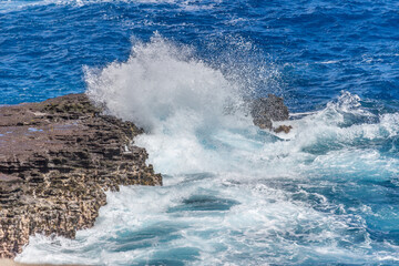 Dramatic Ocean crashing wave Hawaii at Makapu Point