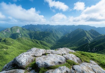 Fototapeta premium Breathtaking mountain landscape with lush green hills and blue sky