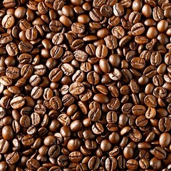 Obraz premium Roasted coffee beans background. Close up of roasted coffee beans.