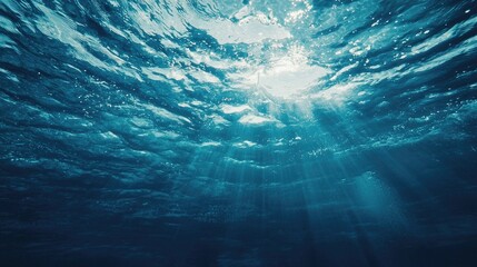 ark blue ocean surface seen from underwater