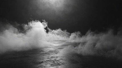 Fototapeta premium A dark, atmospheric background featuring a thick fog rolling across a black floor. The scene is reminiscent of a mystical landscape, with the fog symbolizing mystery, obscurity, and the unknown. The d