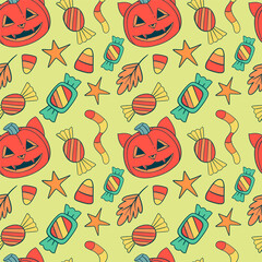 A Playful Halloween Pattern Featuring Colorful Pumpkins and Delicious Candy Designs