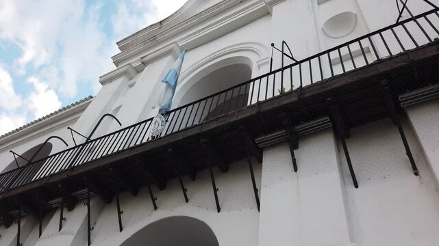 Close up view at balconies Argentine flag and colonial building The Cabildo sky sunset background landmark of Buenos Aires Capital City