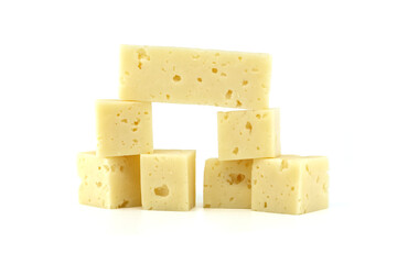 Stack of Swiss cheese cubes isolated on white background