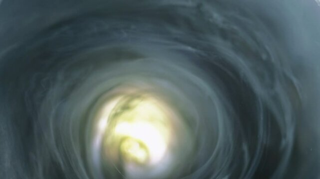 Smoke vortex. Blur mist swirl. Storm twirl. Defocused blue glowing paint water blend spiral rotating motion abstract art background.