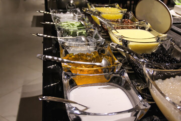 Mixed ice dessert set  in a glass bowl with ladle