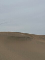 sand dune with sky
