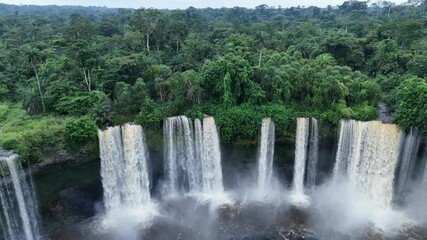 Seven rivers form the Agbokim waterfalls in Etung, Nigeria Cross River State - pullback aerial reveal