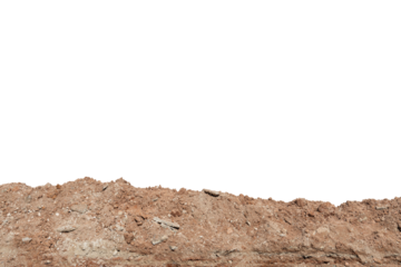 A long pile of brown-orange colored soil. On isolated white background with clipping path.