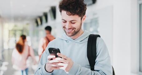 Campus, results or happy man with phone in college for learning application or education. Social...