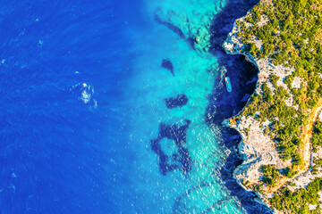 Blue caves on Zakynthos island or Zante Island, Greece. Beautiful views of azure sea water and nature with cliffs cave