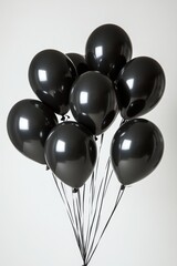 A collection of glossy black balloons tied together, symbolizing elegance and celebration. Perfect for parties and events. Generated AI