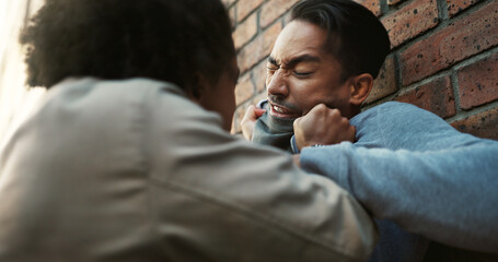 Anger, conflict or fighting with men in city for aggressive disagreement, physical harm and...