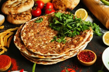 Turkish Lahmacun With Parsley and Side Dishes