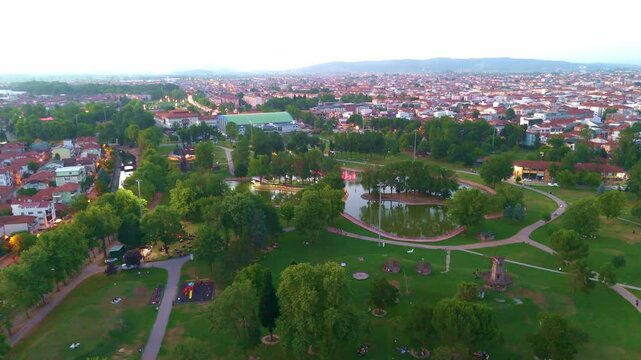 Aerial view a park with a pond.