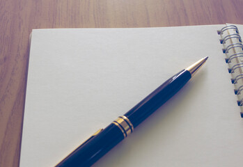 open diary book with pen , my story