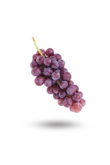 Flying bunch of red grape with shadow isolated on white background , clipping path.