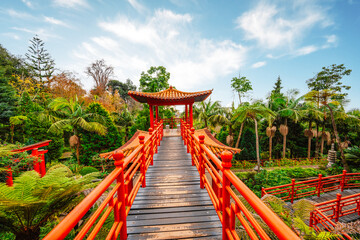 Monte Palace, Tropical Garden with Waterfalls, Lakes and traditional buildings above the city of...