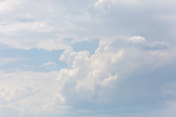 Clouds on the blue sky as a background