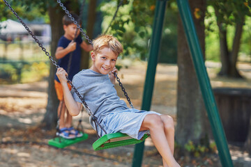 Photo of happy kid at playground outdoor