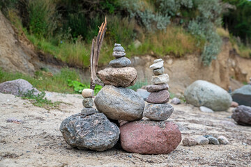 zen stones on the beach in summer day
