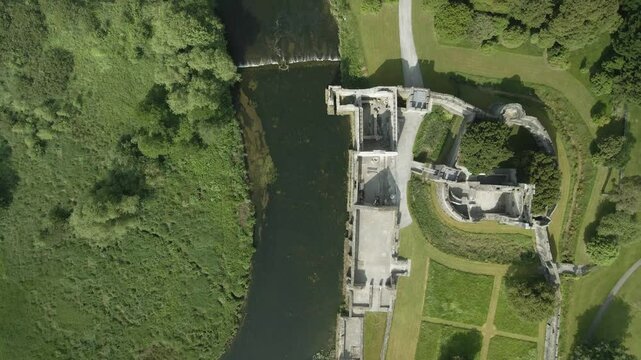 Adare castle and river maigue in county limerick, ireland on a sunny day, aerial view