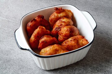 Gogodo or Frid bananas on a plate. Pisang goreng gogodo