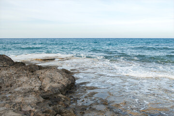 sea ​​water accumulated between rocks. Sea wave between rocks. Carved rocks by the sea. sea water trapped between rocks.
 Cyprus.
