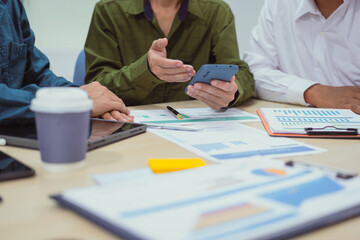 Close-up of a businessman in a meeting at the office discussing topics related to digital marketing...