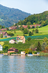 Close-up of waterfront view of Swiss village near Lucerne, Switzerland, 19 Aug 2022