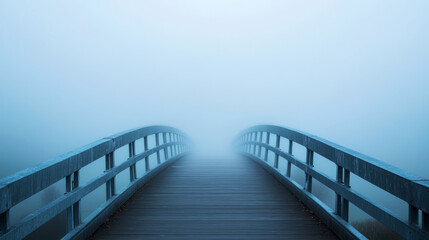 Fototapeta premium Mysterious foggy bridge in the woods - a lone bridge stretches into the misty distance, creating an atmosphere of mystery and intrigue.