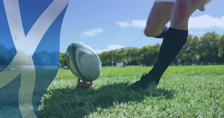 Animation of flag of scotland over caucasian male rugby player kicking ball - Powered by Adobe