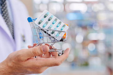 Medicine set in shopping cart for medicine buying market consumer products retail in pharmacy drugstore with copy space for text