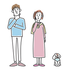 おしゃれな若い夫婦と可愛い子犬
