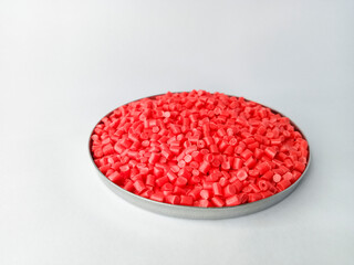 Red masterbatch granule, red pigment, red polymer granules in a cup, cold cutting type granule...